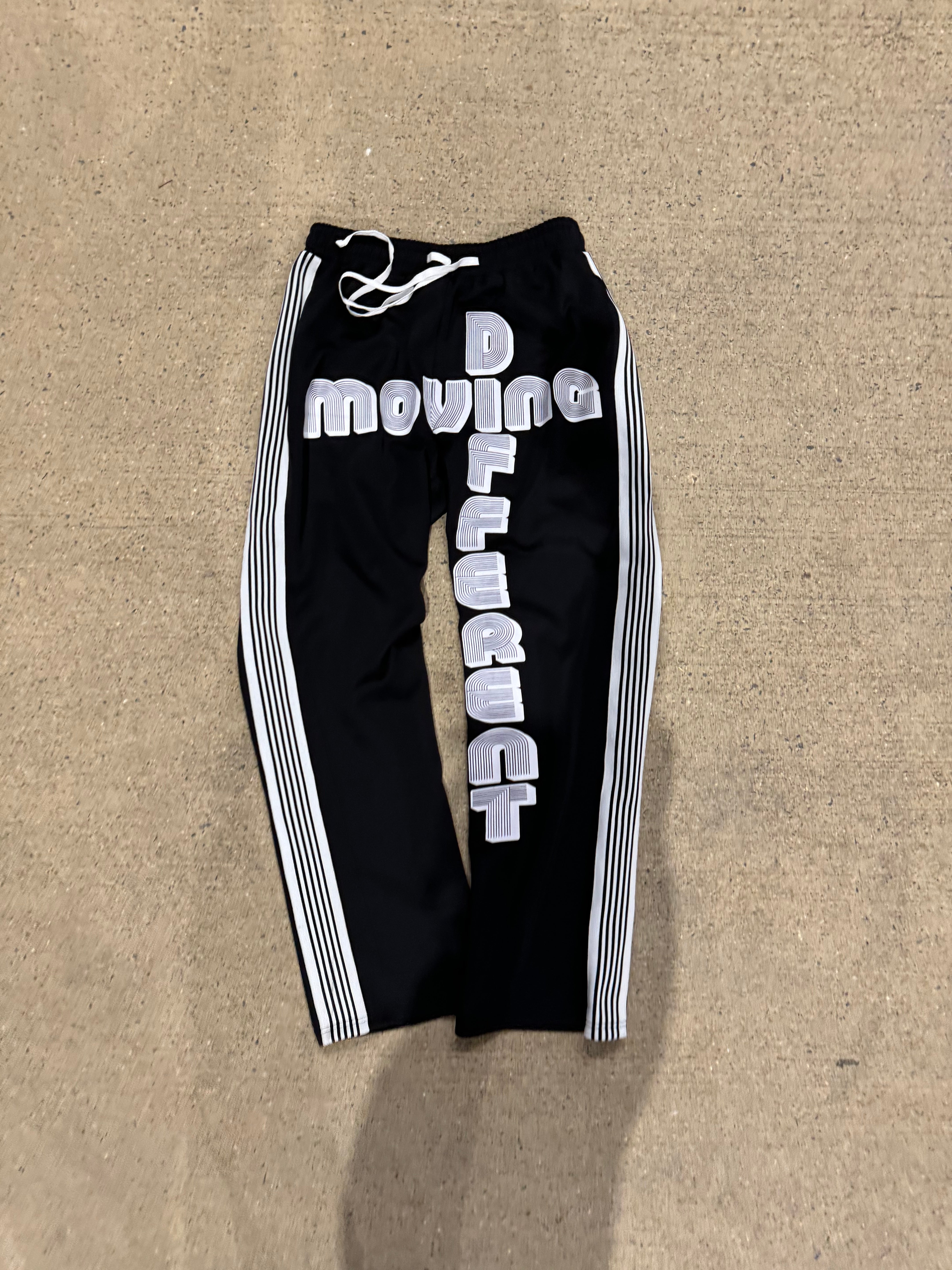 MOVING DIFFERENT BLACK CROSSUP TRACK PANTS